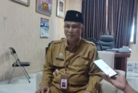 Kepala Dinas Pendidikan Moh Iksan saat diwawancarai di ruang kantornya.( SetaraInfo)