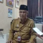Kepala Dinas Pendidikan Moh Iksan saat diwawancarai di ruang kantornya.( SetaraInfo)